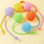 Interactive cotton ball cat toy with bite-resistant ropes for teeth cleaning